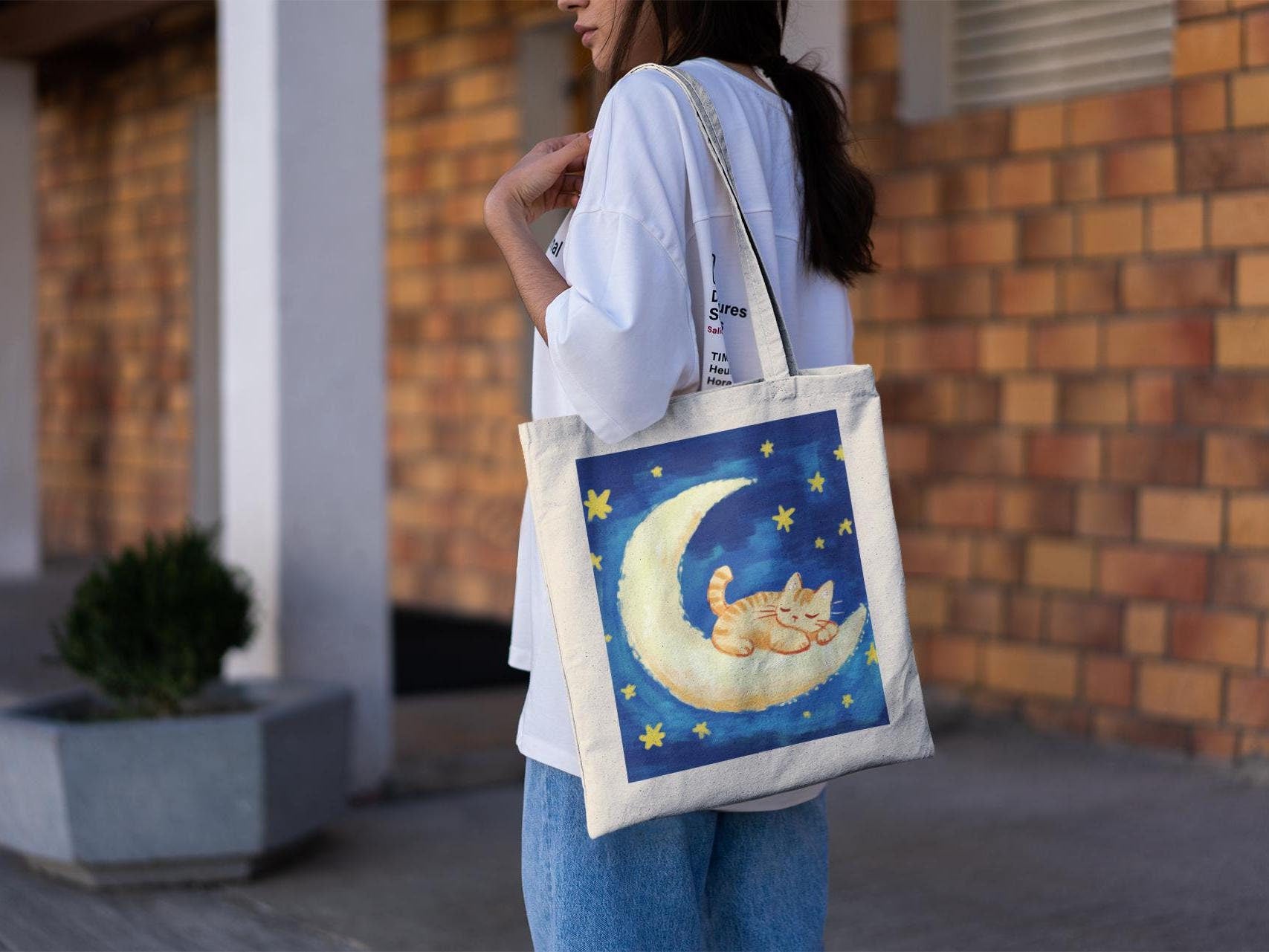 Sleepy Kitty on the Moon Tote Bag